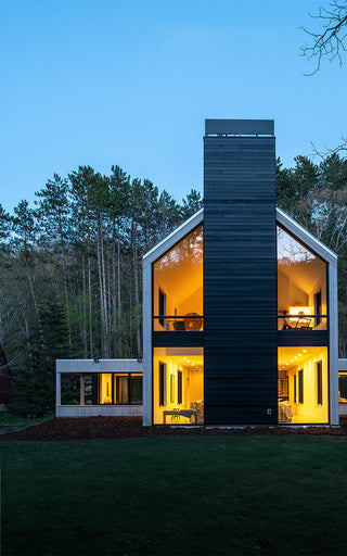 A slate gray house hydrant v2+ installed on the This Old House modern barnhouse near St. Paul, Minnesota.