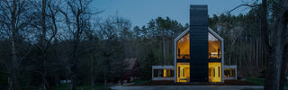 A slate gray house hydrant v2+ installed on the This Old House modern barnhouse near St. Paul, Minnesota.