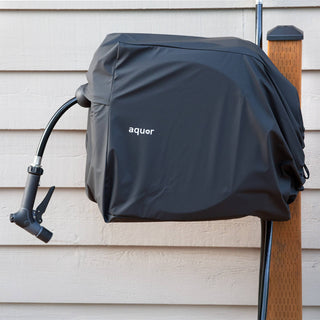 Aquor Retractable Hose Reel Cover in Jet Black on a Charcoal Hose Reel installed with a House Hydrant V1+