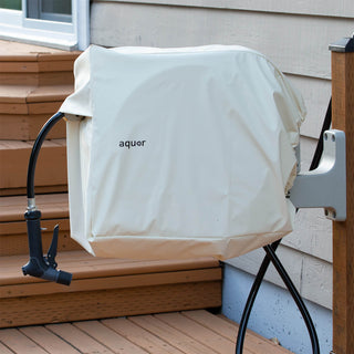 Aquor Retractable Hose Reel Cover in Cream on a stone Hose Reel installed with a House Hydrant V1+