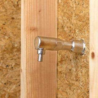 A half inch elbow PEX crimp inlet connected to the backend of a Aquor house hydrant.