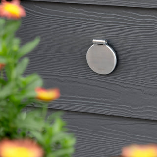 A brushed stainless v1+ debris cover shown on gray lap siding.