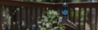 Aquor comfort grip vb hose connector hanging over a fence. 