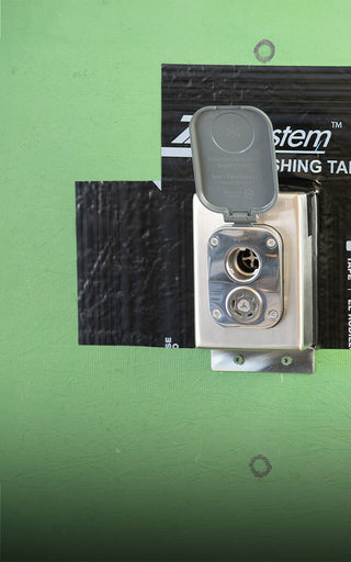 Stainless steel mounting box v2+ and slate gray house hydrant v2+ installed on sheathing with zip system flashing.