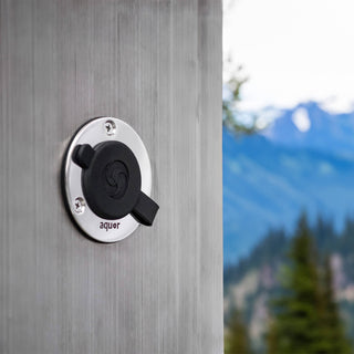 A plug cover shown on a universal hydrant installed on a post.