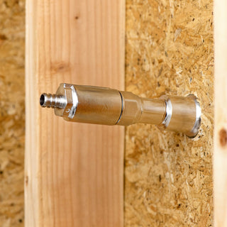 A half inch PEX crimp inlet connected to the backend of a Aquor house hydrant.