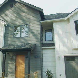 A video showing the Hot and Cold Hydrant installed on the side of a home with white lap siding.