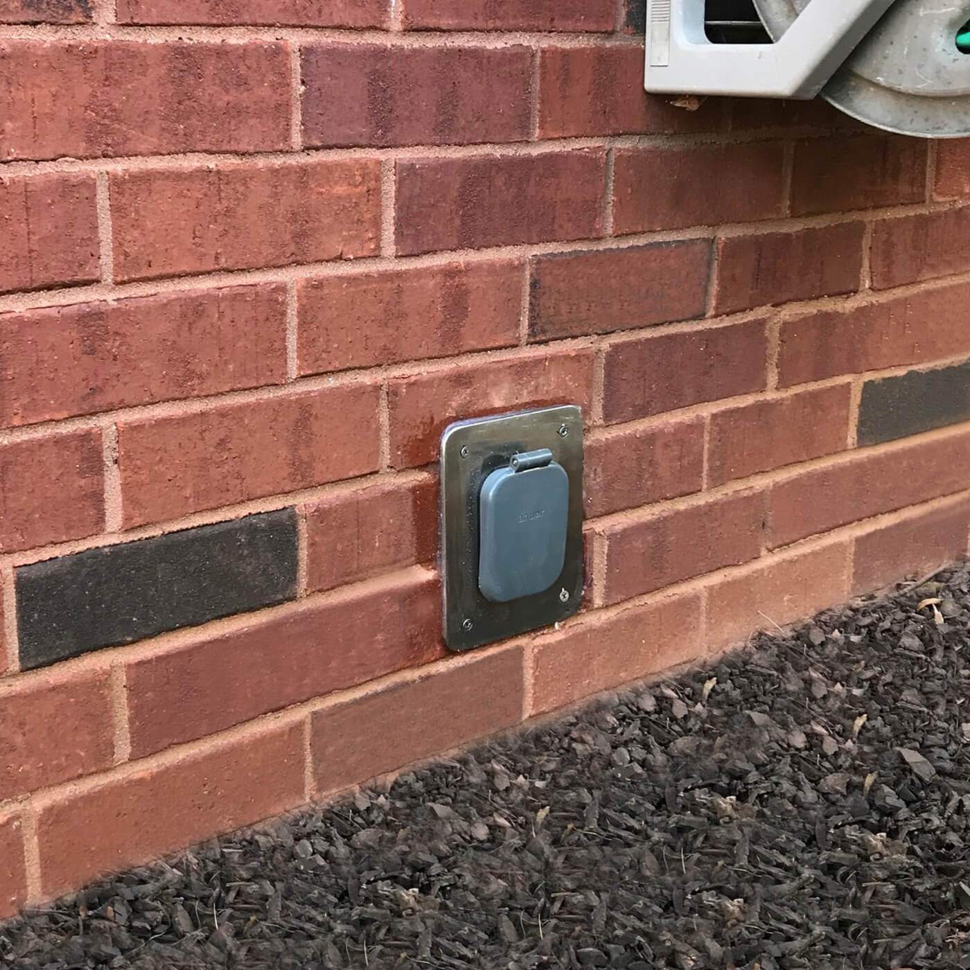 Aquor Stainless Steel Mounting Plate V2+ for House Hydrant V2+ installed on brick
